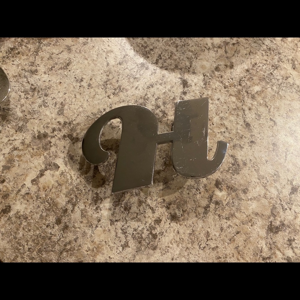 H belt buckle